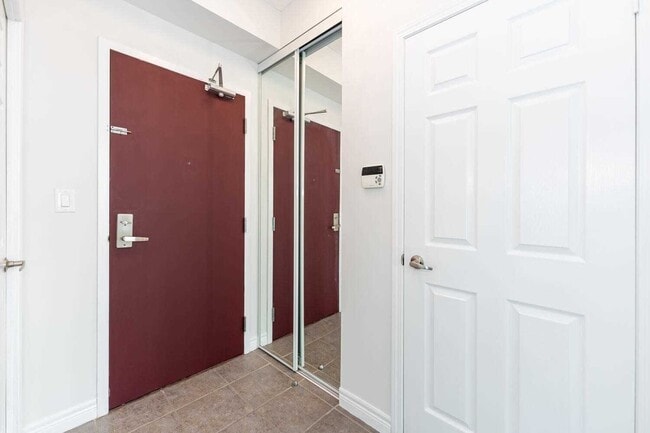Building Photo - 208-3208 Enfield Pl