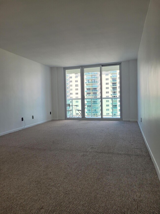 Building Photo - 19380 Collins Ave
