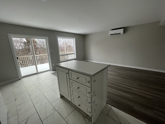 Building Photo - NEWLY RENOVATED TWO BEDROOM SEMI-DETACHED ...