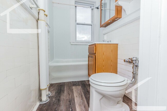 Photo - RENOVATE HUGE ASTUDIO WITH IN UNIT LAUNDRY... House