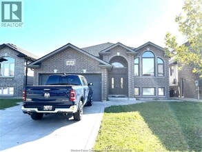 Building Photo - 4832 Periwinkle Crescent