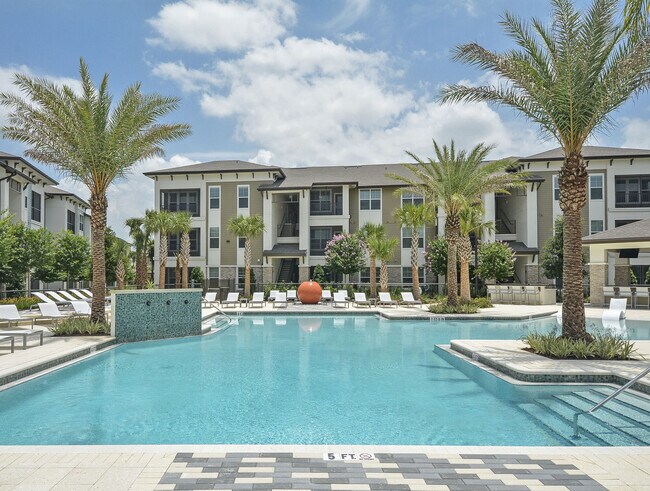Beach Inspired Zero Entry Pool with Surrounding Sun Decks - Marvera Casselberry