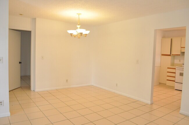 Building Photo - 3835 Cocoplum Cir