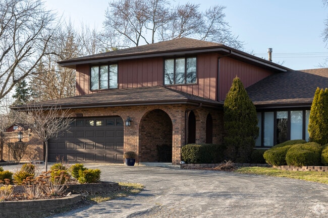 Housing styles vary in this charming suburban setting.