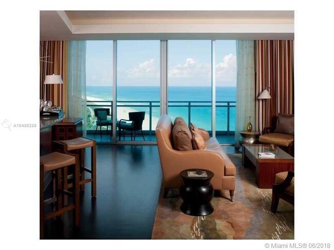 Building Photo - 10295 Collins Ave
