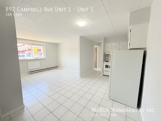 Building Photo - COZY 1 BED/1 BATH MAIN FLOOR UNIT -WALKING...