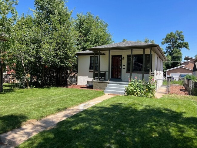Photo - Updated 4-bed, 2-bath home - Blocks from Regis University!