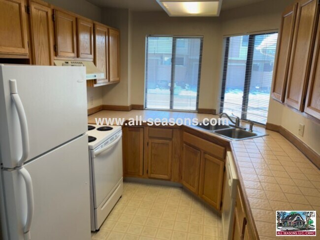 Building Photo - An awesome find with this townhome located...