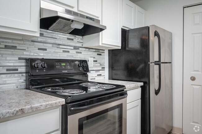 Riverwood | Kitchen Stove and Fridge - Riverwood Heights Apartments