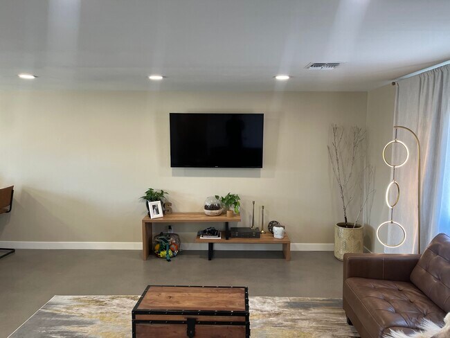 Living room/entertainment - 3041 E Yucca St