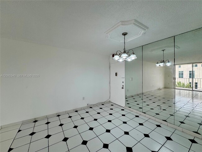 Building Photo - 4675 W 18th Ct
