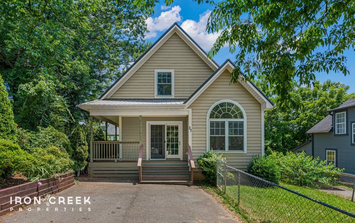 Primary Photo - Charming Three-Bedroom Home with Solar Pow...