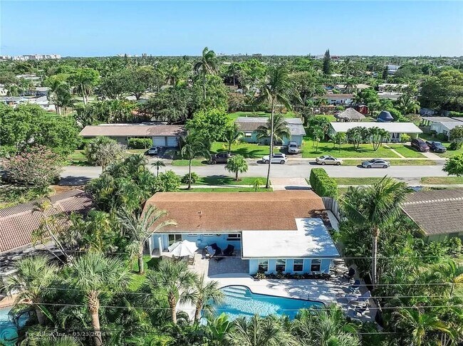 Building Photo - Tropical Oasis Home in THE COVE! ONE MILE ...