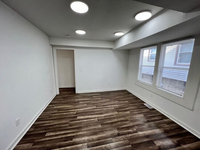 Building Photo - Updated 5BR Home with Modern Finishes & Extra Space