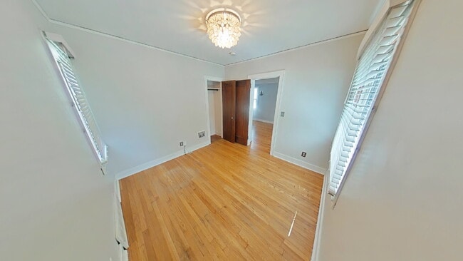Building Photo - "3-Bed Home with Gleaming Hardwood Floors ...
