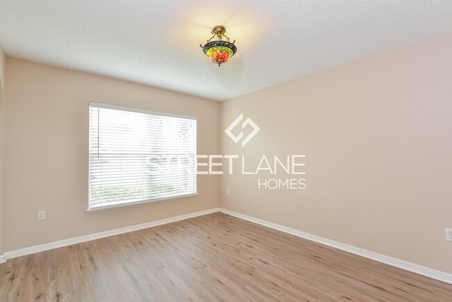 Building Photo - REDUCED PRICE!- $500 off first month's ren...