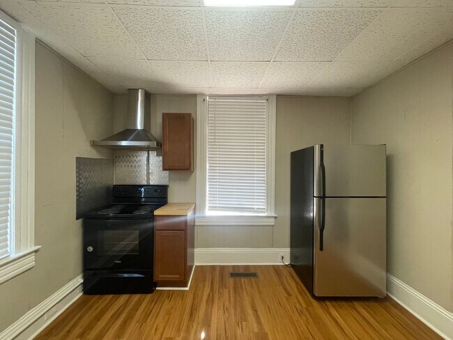 Building Photo - Utilities Included - One Bedroom Apartment...