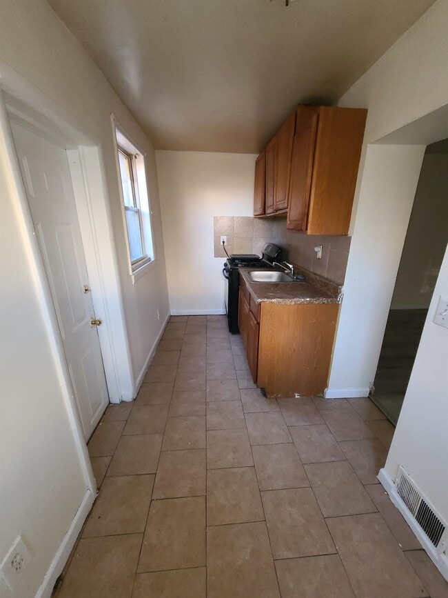 Building Photo - 6165 Delancey St