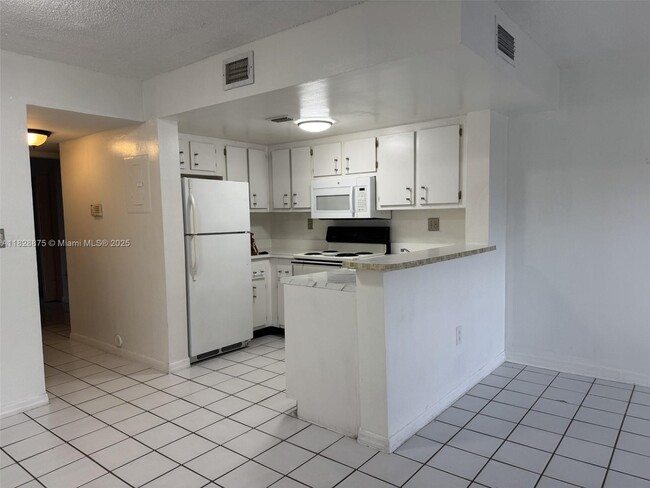 Building Photo - 8670 NW 6th Ln