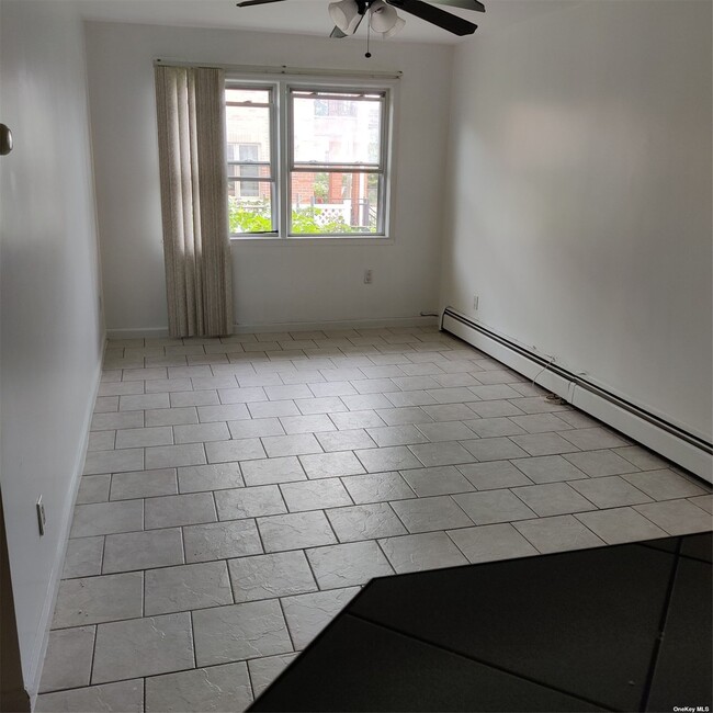 Building Photo - 11-71-71 129th St