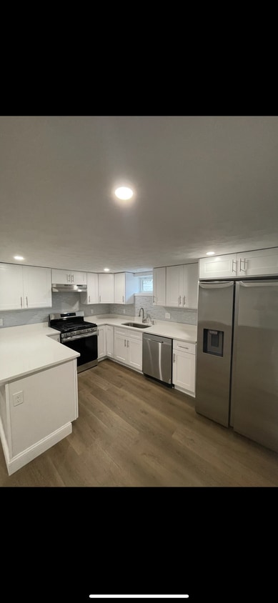 Kitchen is equipped with gas stove, dishwasher, and Samsung refrigerator - 31 Stowers St