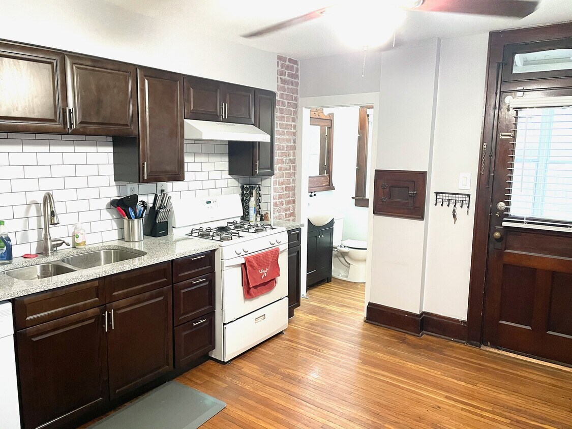 Exposed Brick in Kitchen with rare 1/2 bath - 247 E Jenkins Ave