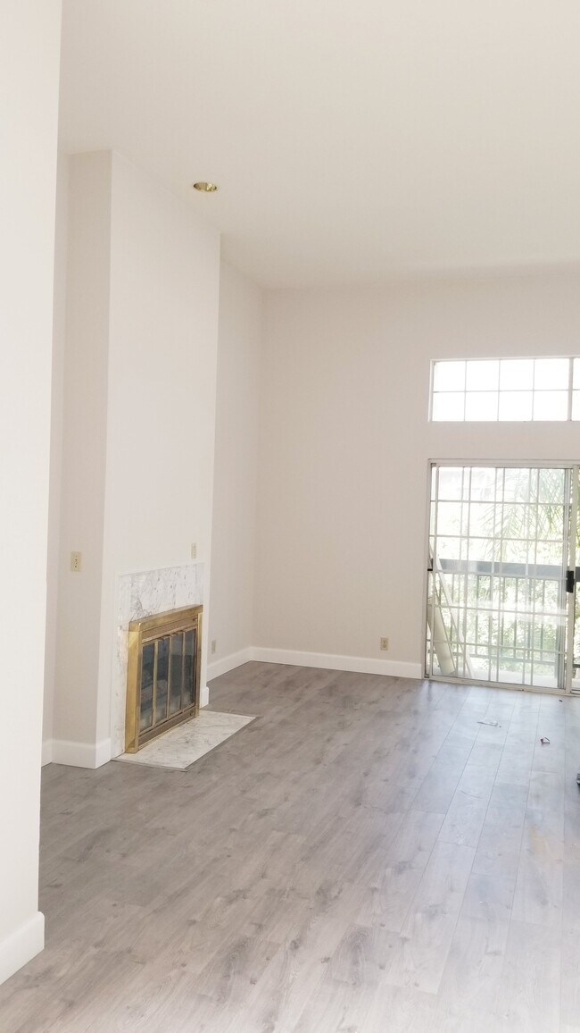 large open floor plan living and dining room - 10650 Kinnard Ave