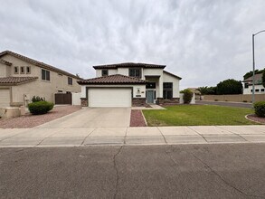 Building Photo - 6788 W Aurora Dr