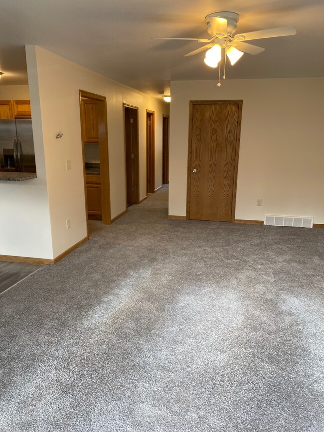 living room area looking down hallway - 950 W Wilson St