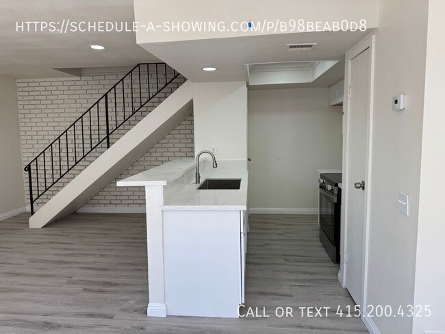 Building Photo - Charming 2-Bedroom Condo with Endless Pote...