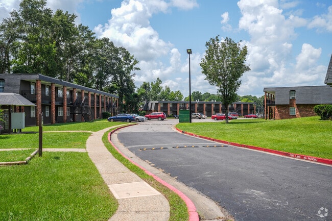 Building Photo - Summit at the Village Apartments