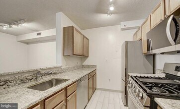 Building Photo - 7111 Woodmont Ave