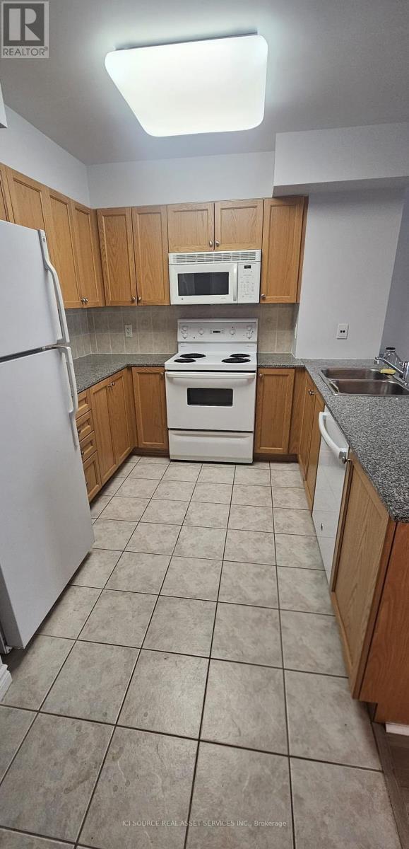 Photo du bâtiment - 206-1730 EGLINTON Ave