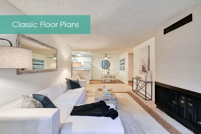 Living room with fireplace at The Meadows Apartment Homes - Meadows Apartments