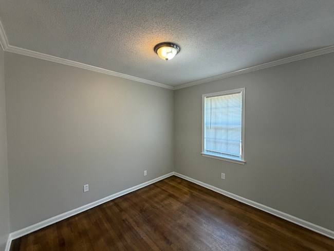 Building Photo - Charming 3BR/1.5BA Bartlett Area Home | Brick Fireplace, Tile Kitchen & Fenced Yard