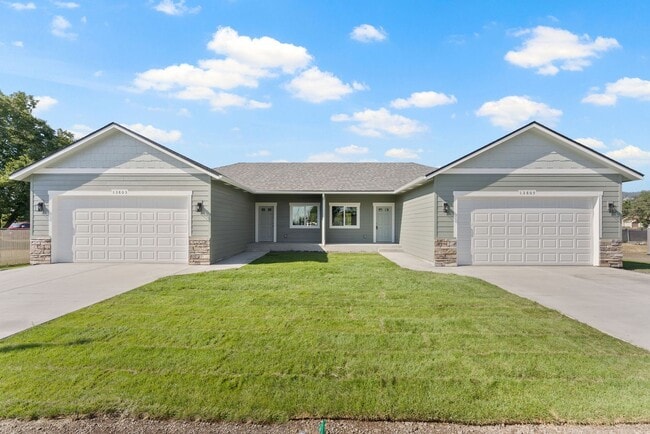 Building Photo - Newly built 4 Bedroom Duplex With Garage