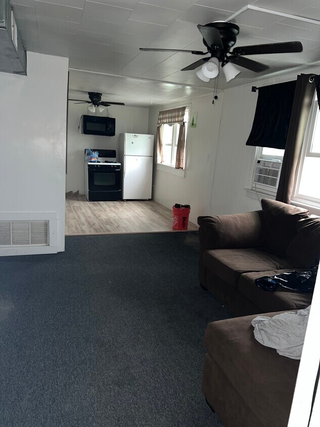 Living room and kitchen - 3049 E 138th Plz