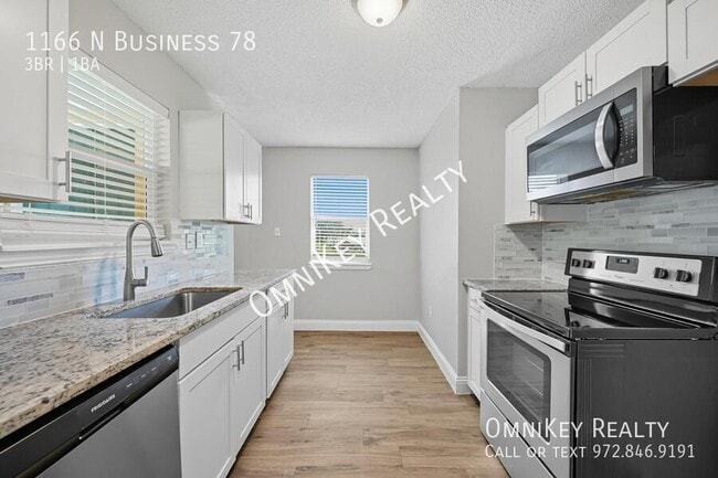 Building Photo - 1166 N Texas 78 Business