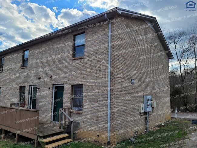 Building Photo - Alluring Brick Home