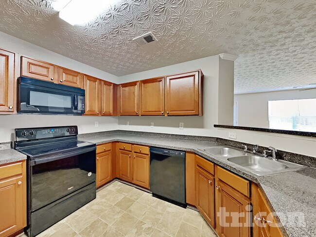 Foto del edificio - 7637 Garnet Dr