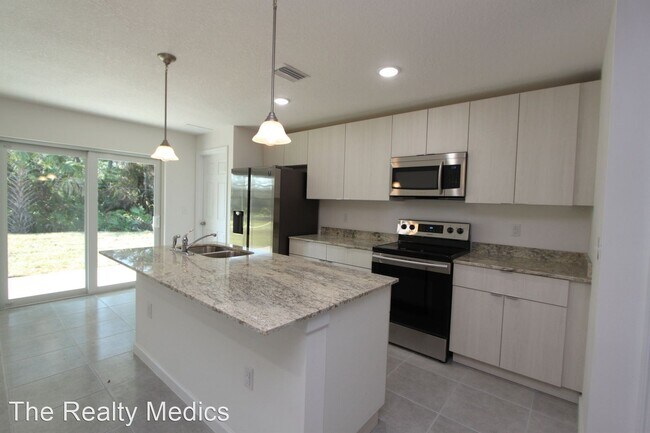 Foto del edificio - 4 br, 2 bath House - 1598 Jupiter Blvd NW
