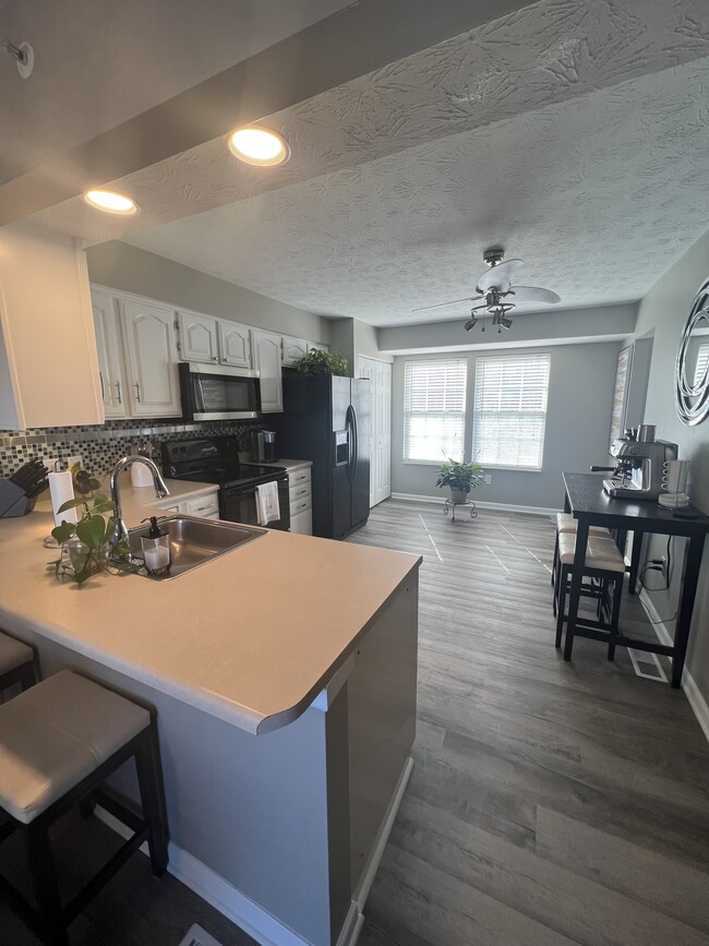 updated kitchen with new appliances - 201 Mountain Dr