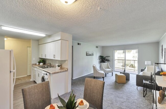 Dining room/living area - 7755 E Quincy Ave