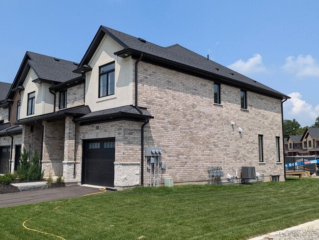 Building Photo - Beautiful End Unit Available – $2,750/month – Available Immediately
