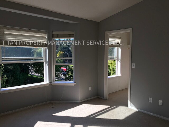 Building Photo - Beautiful Three Story Townhouse with Gas Fireplace, Balcony & 2-Car Garage