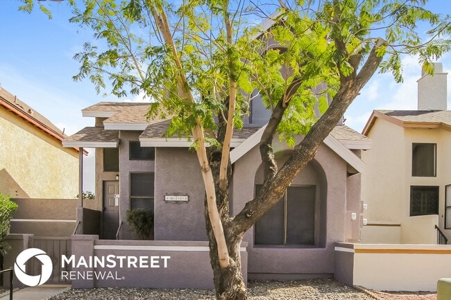 Building Photo - 6713 W Aire Libre Ave