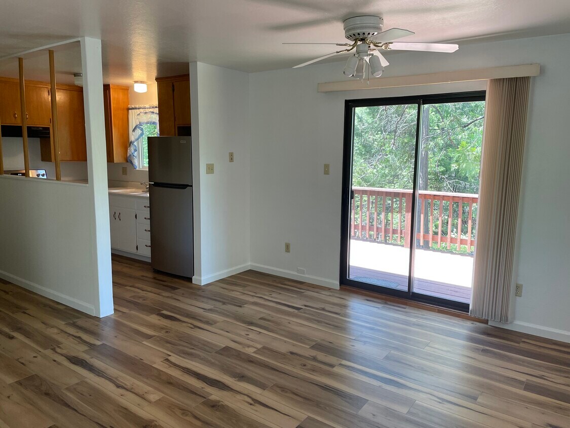 Dining room, kitchen and back deck. - 20695 Parkside Ln