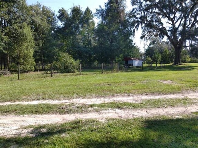 Building Photo - 6455 NW 135th Ave