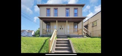 Building Photo - 715 1/2-570-572 E Main St