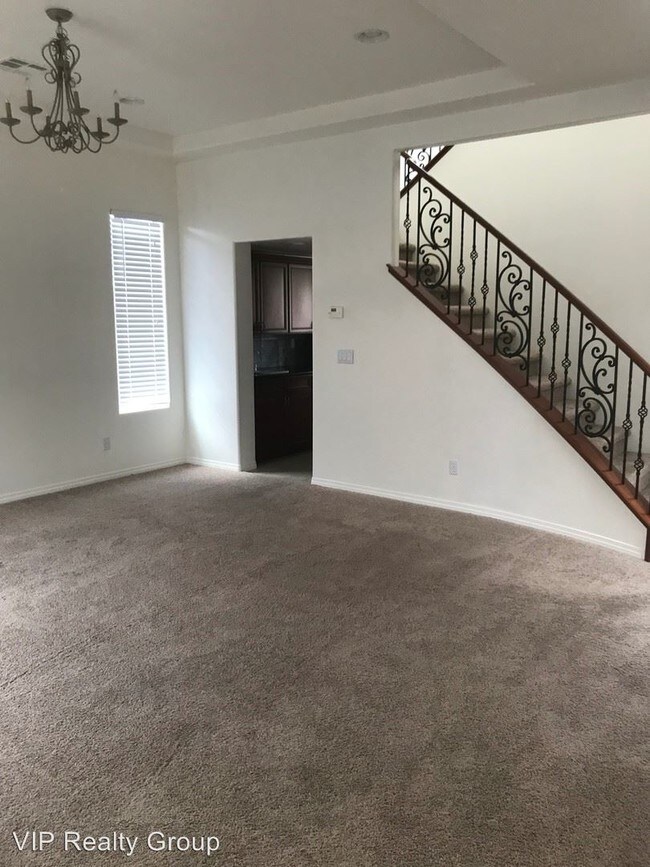 Building Photo - 4 br, 3.5 bath House - 7408 Midnight Rambler